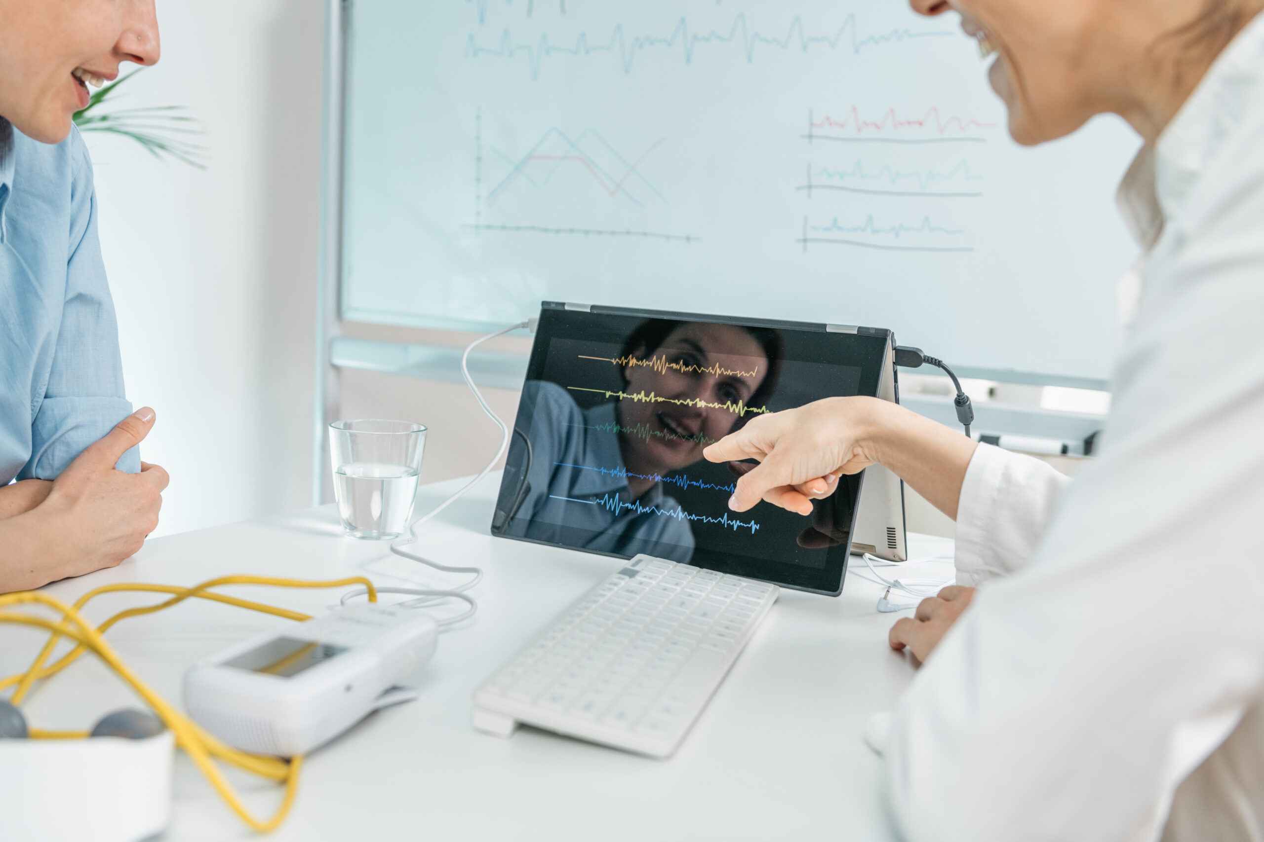 Biofeedback Training. Biofeedback Practitioner and Patient in Consultation